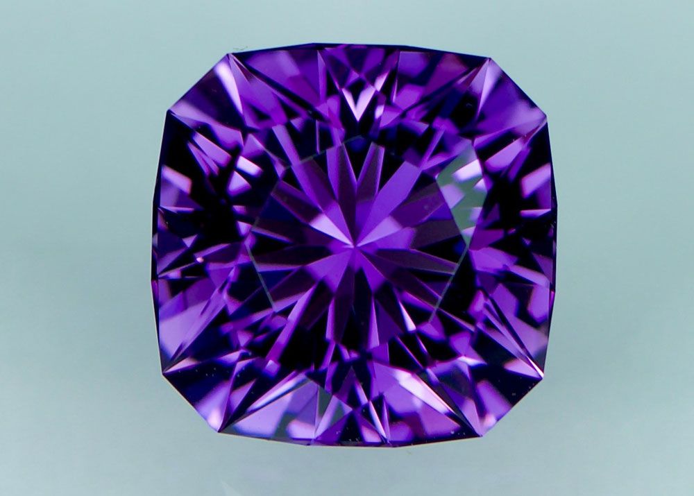 Bright and vivid purple faceted amethyst gemsone
